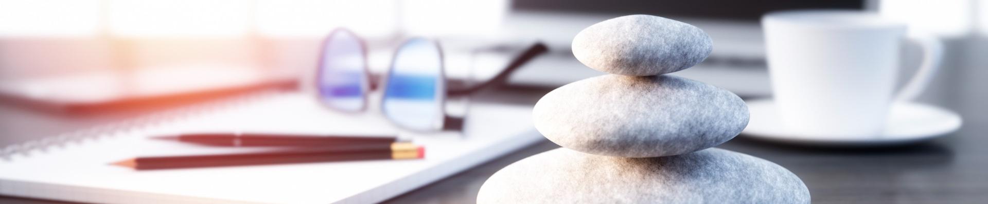 stack of pebbles on desk